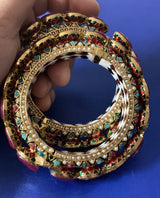 A stunning side view of the bangles showing off their intricate designs