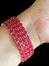 Final image showing the bracelet being worn.